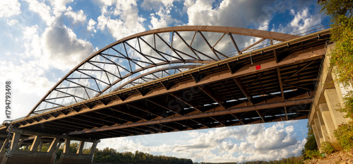 Dramatic panoramic view of the Veterans Memorial Bridge over the Missouri River at St. Charles, MO from below