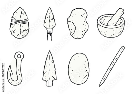 Primitive stone tools and artifacts: spear, mortar, pestle, fish hook