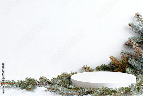 A simple white podium surrounded by fir branches. The background is plain, emphasizing the podium for product display. Ideal for advertising purposes.