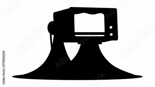 Silhouette of a vintage television set resting on two large trumpet like stands in black and white