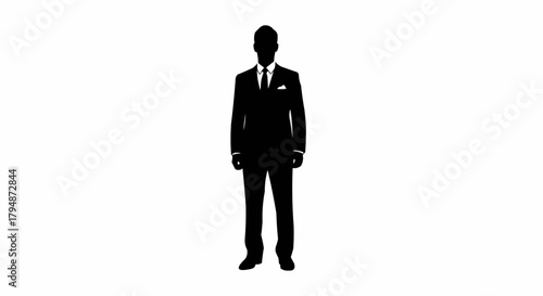 Silhouette of a Man in a Suit Standing Tall.