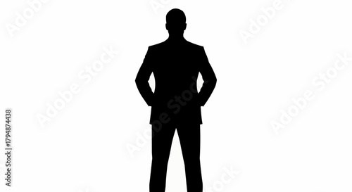 Silhouette of a man in a suit standing with hands on hips.