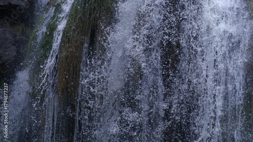 Wallpaper Mural Thin streams of falling water cascading over wet moss and stone in Ultra slow motion captured with a high-speed camera Torontodigital.ca
