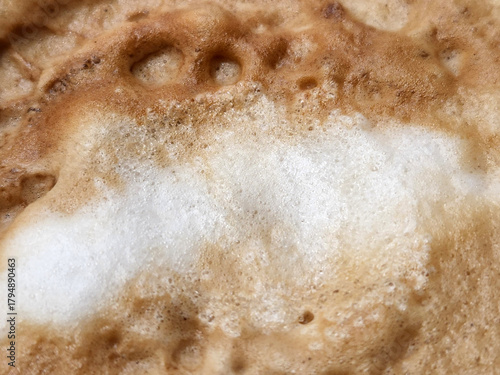 Foam background. Close-up of coffee foam. Coffee
