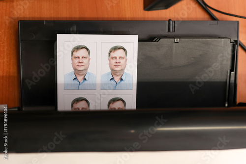 Printing documents a printer. Photo studio service - creating photos for passports, passes, and ID cards.