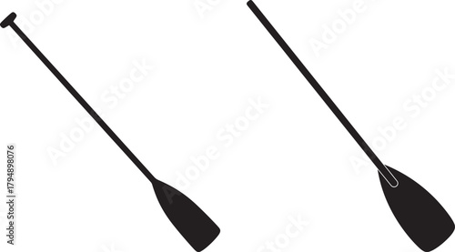Two black canoe paddles silhouette isolated on transparent background
