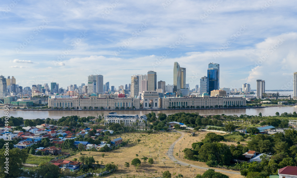 Naklejka premium Cityscape view of the capital city skyline of Phnom Penh, Cambodia located in South East Asia