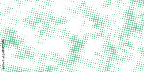 Abstract background with a modern green halftone dot pattern on a white surface.