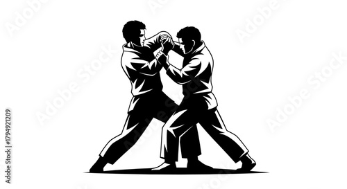Two martial artists engaged in a grappling stance, showcasing strength and discipline in combat sports.