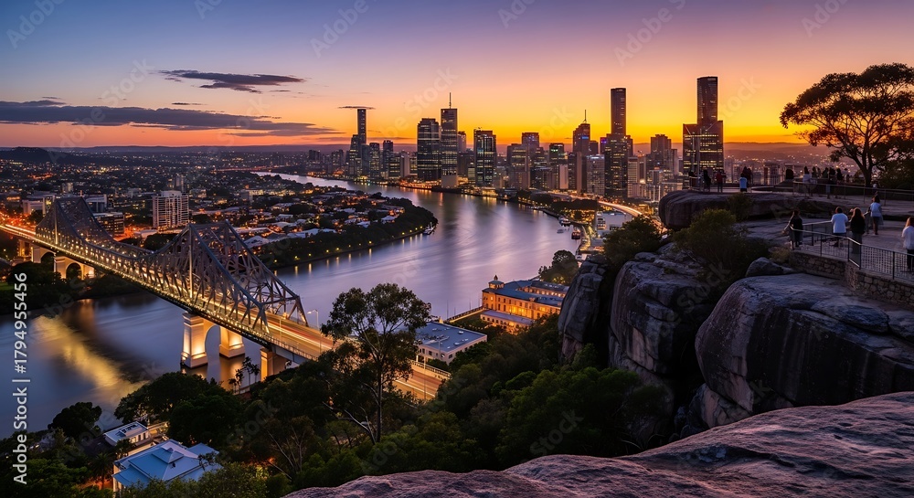 Fototapeta premium Brisbane Cityscape at Sunset with Story Bridge and River.