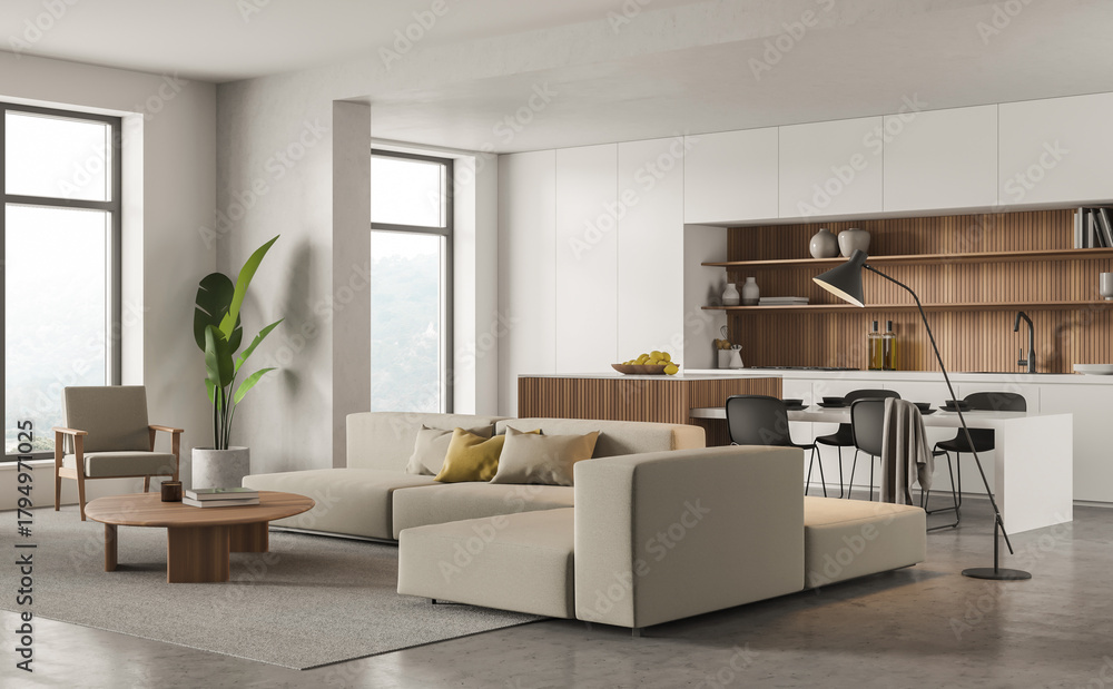 Fototapeta premium Corner view with sofa from white panoramic kitchen with wooden splashback