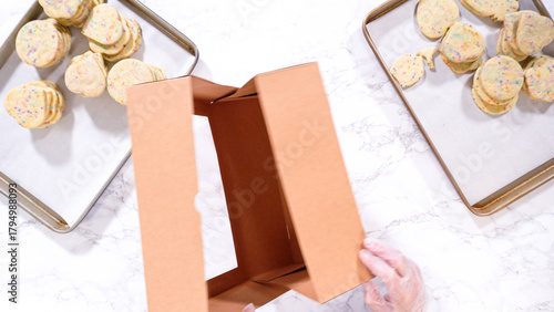 Packing Sprinkle-Adorned Sugar Cookies into Boxes