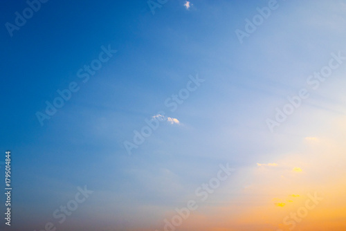 Evening sky with colorful few cloud sunset and blue sky on twilight. golden light before sundown. copy space
