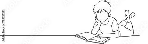 continuous line drawing of young boy in prone position on floor reading a book, line art vector illustration