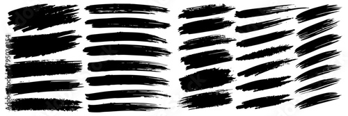 Set of textured black brush strokes and highlighter smudges, artistic ink marks, vector format