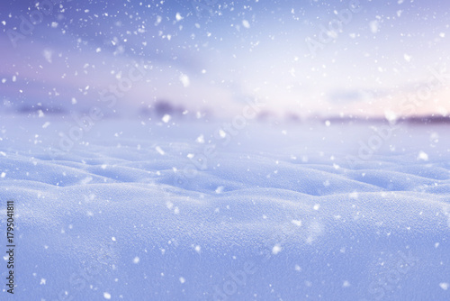 Photos serene winter landscape with soft snowdrifts and falling snowflakes under a pastel sky, creating a peaceful and dreamy seasonal atmosphere