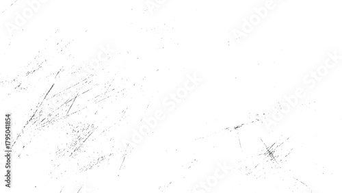 Abstract textured background with scattered gray dust particles and thin linear scratches on a white surface
