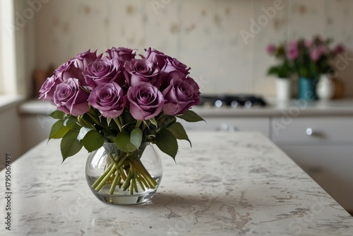 dark purple roses in a vase against a kitchen background