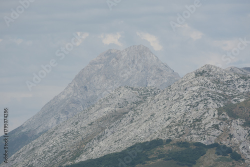Majestic Espiguete Mountain Peak Under Cloudy Sky