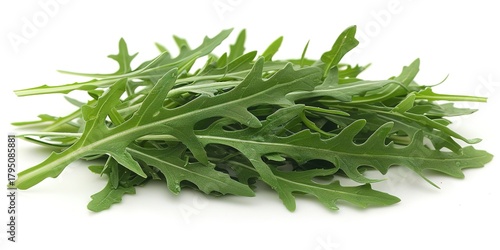 Fresh green arugula leaves piled on a white background, vibrant and healthy