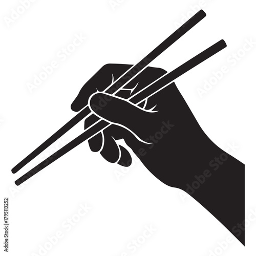 a silhouette of a hand holding chopsticks