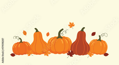 A charming autumn arrangement of pumpkins and colorful falling leaves creates a warm and inviting seasonal display, perfect for fall celebrations.