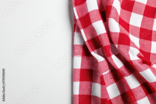 Red Gingham Tablecloth: A classic red and white gingham tablecloth, elegantly draped, offering a rustic charm and versatile backdrop for various culinary and design concepts.