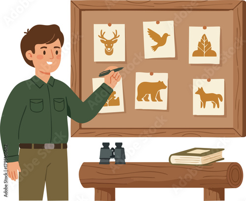 A wildlife educator presents animal silhouettes on a bulletin board beside binoculars and a field guide