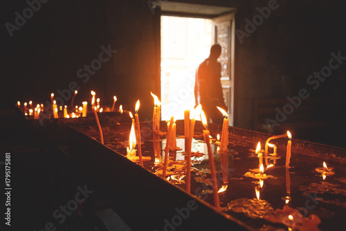 Burning candles in a church.