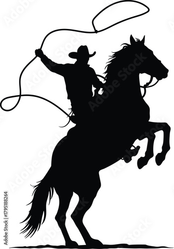 Dynamic Cowboy Silhouette Roping While Riding a Powerful Rearing Horse