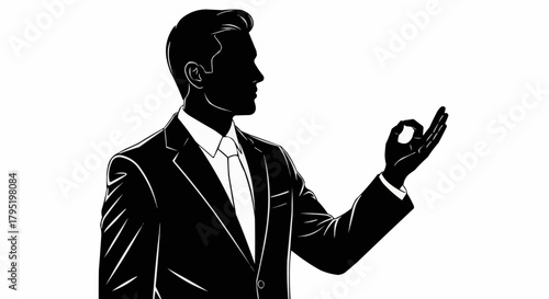 Silhouette of a professional businessman making an okay gesture.