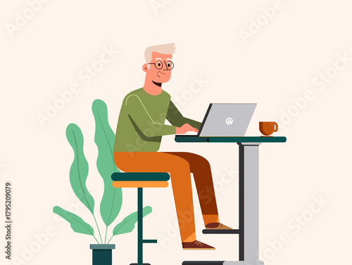 Elderly man with glasses working on a laptop at a high table with a plant and coffee cup