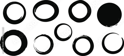 Abstract hand-drawn ink brush circles set on a white background