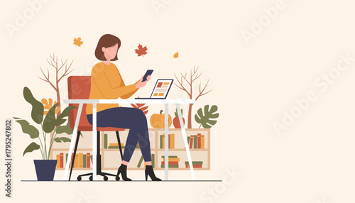 Woman working remotely at an autumnthemed desk with laptop and phone Home office concept