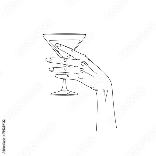 Hand holding a cocktail glass with a stylish and minimal design  