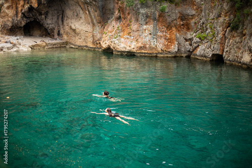 Fototapeta Naklejka Na Ścianę i Meble -  Sea and swimming girls view from above Mediterranean Sea, Antalya