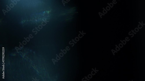 Abstract dark blue background with lens flare for creative video projects, perfect for tech intros and mysterious scenes, adding depth and visual intrigue