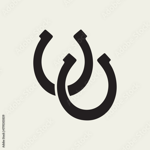 Minimalist black featuring two interlocked horseshoes on a light background Bold simple icon symbolizes good luck fortune protection and is often associated with equestrian and country themes Vector