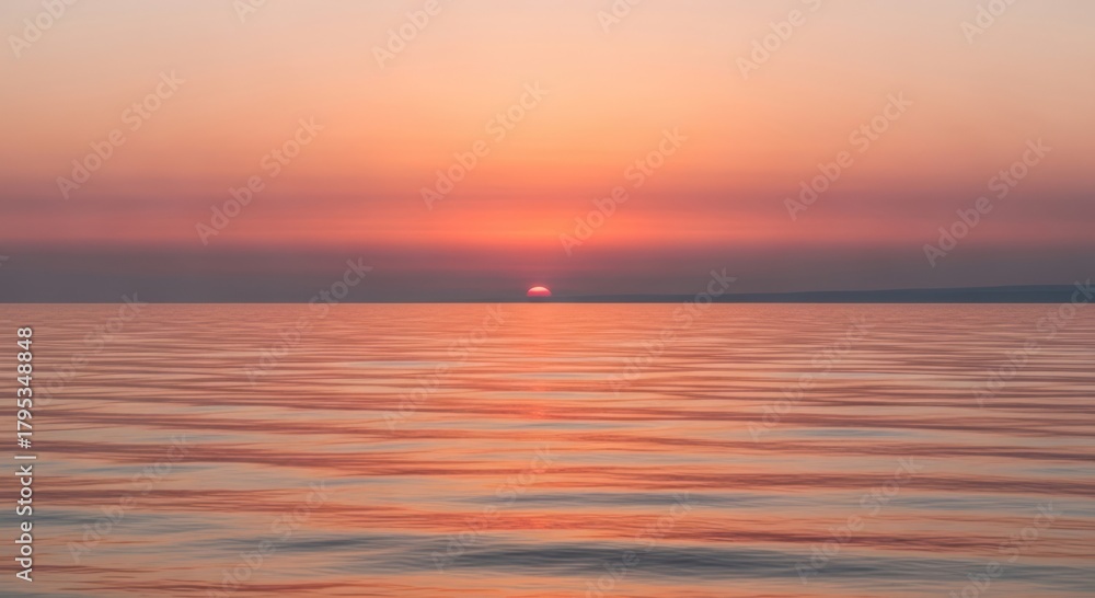Fototapeta premium Serene Ocean Sunset Horizon with Calm Water and Vibrant Sky Hues