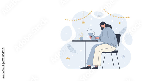 Cozy remote work Woman using tablet at a table with winter holiday decorations