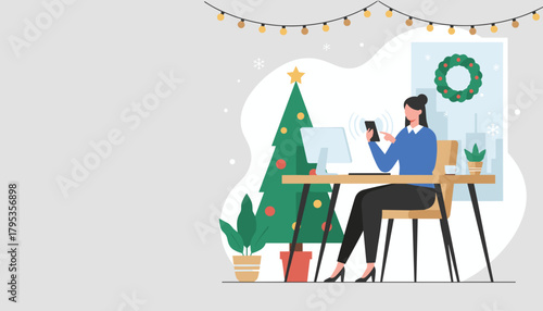 Woman using phone at decorated office desk handling business tasks during the winter holidays
