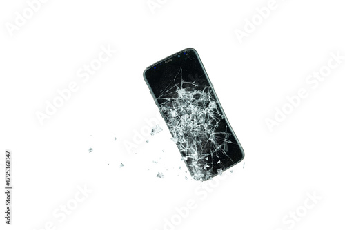 smartphone as it falls and hits the ground and the screen breaks, pieces of glass flying to the side. Transparent background. Png image