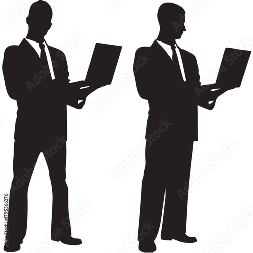 Two black silhouettes of a businessman in a suit and tie, standing while holding and using a laptop computer.