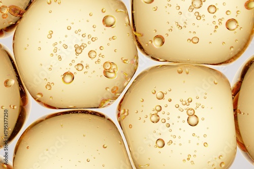 Golden translucent capsule-like forms with internal microbubbles, ideal for supplement branding, wellness advertising, and premium macro visuals