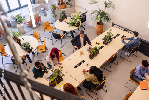 Diverse business team collaborating in a modern open plan office