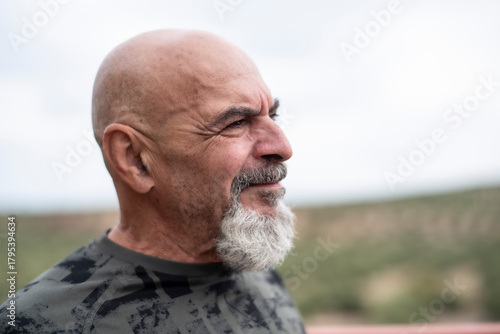 65-year-old man, close-up portrait after playing sports