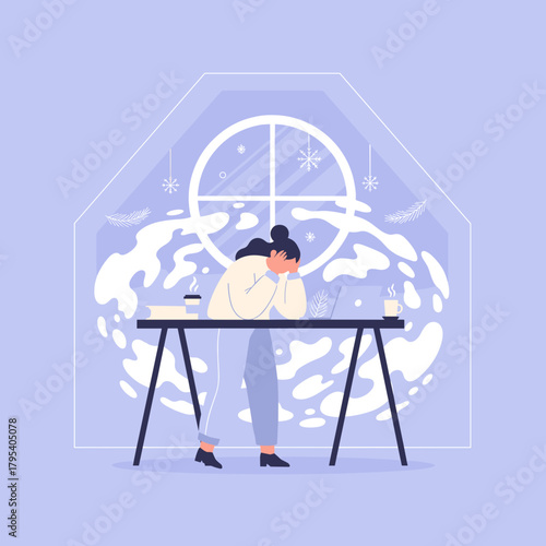 Stressed woman experiencing winter fatigue and burnout while working remotely indoors