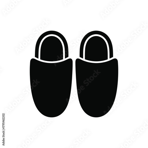 Simple black silhouette of two cozy slippers