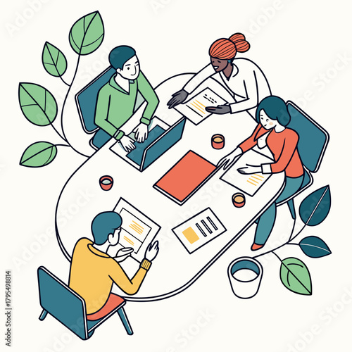 A group of four colleagues are sitting around a table, working together on a project they are using laptops and papers, and they appear to be collaborating effectively