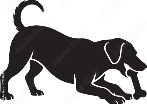 Black silhouette of a dog happily playing with a bone